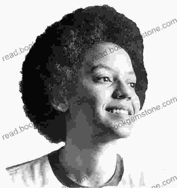 A Black And White Photograph Of Nikki Giovanni Standing In Front Of A Microphone, Speaking To An Audience. Love Poems Nikki Giovanni