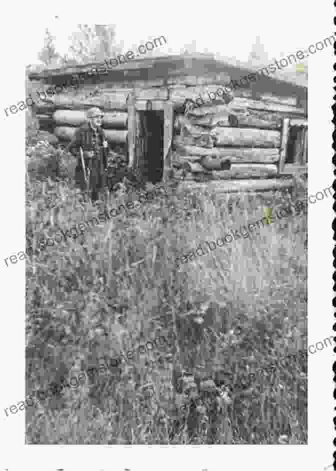 A Colorized Photograph Of Isaac Bell Standing In Front Of A Log Cabin, Holding A Rifle. The Assassin (Isaac Bell 8)