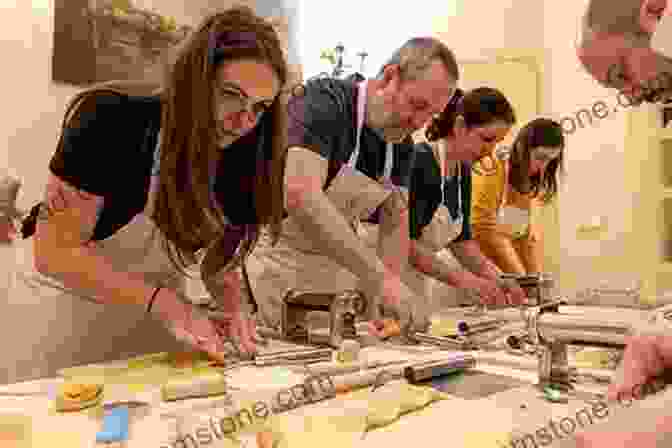 A Group Of People Cooking Pasta In A Cooking Class In Rome Ciao Bella : Six Take Italy