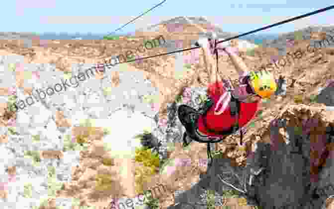 A Person Zips Through The Air On A Zip Line Overlooking A Canyon In Los Cabos Top 5 Adventures In Los Cabos