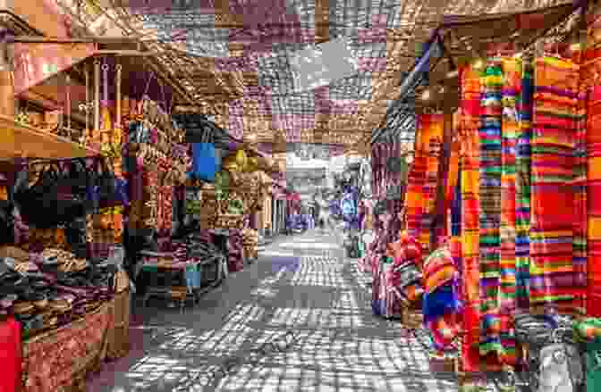 A Vibrant Street Scene In Marrakech, With Traditional Moroccan Architecture And Colorful Textiles. Patagonia Papers: Journeys Where The Sun Dances (Watson Travel 2)