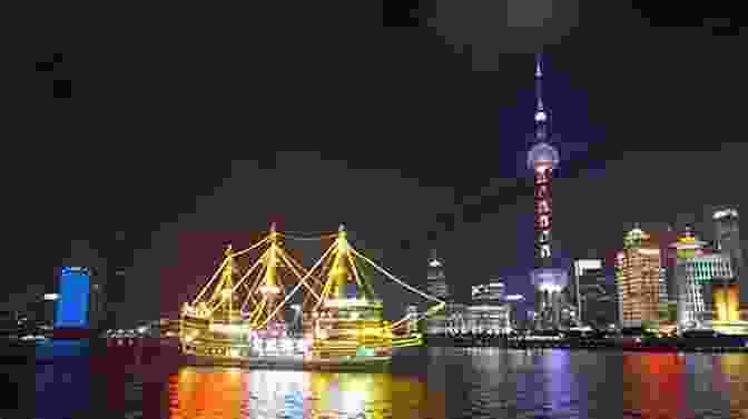 Nighttime View Of The Bund In Shanghai, Showcasing The Illuminated Skyscrapers And The Iconic Oriental Pearl Tower. China The Dragon : A Glimpse Of China: Past And Present Personal Observations With Political Historical Cultural Current Events And Technological Advances Two